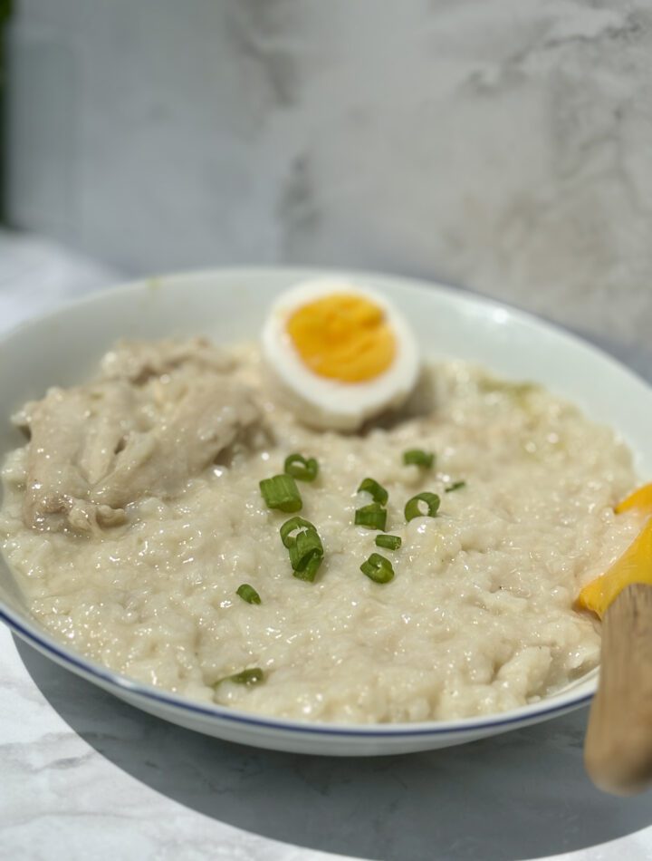 A bowl of chicken rice porridge