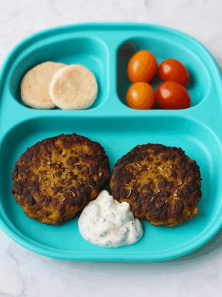 Kabobs for toddlers, here presented as two discs of potato and onion-stuffed ground beef patties (kotlet)