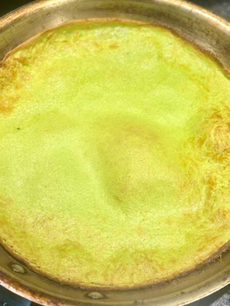 Eggs for dinner, in the form of a broccoli infused dutch baby pancake.