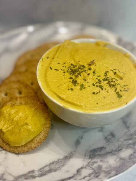 A bowl of carrot dip