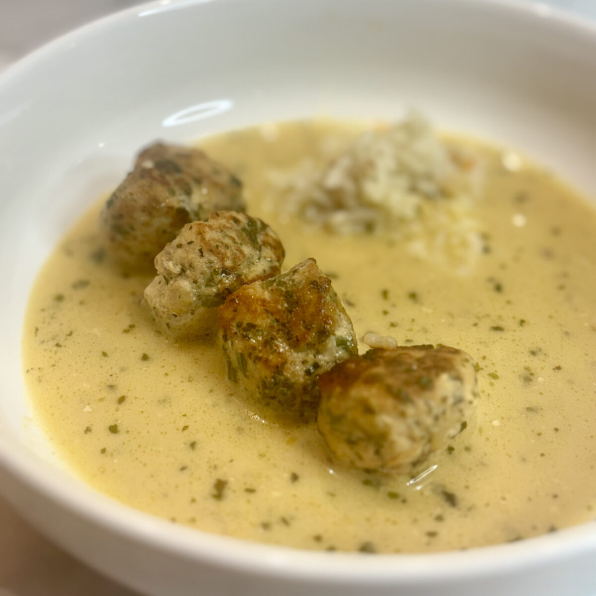 Closeup of a meatball and rice stew that makes an ideal choice for a toddler's first curry