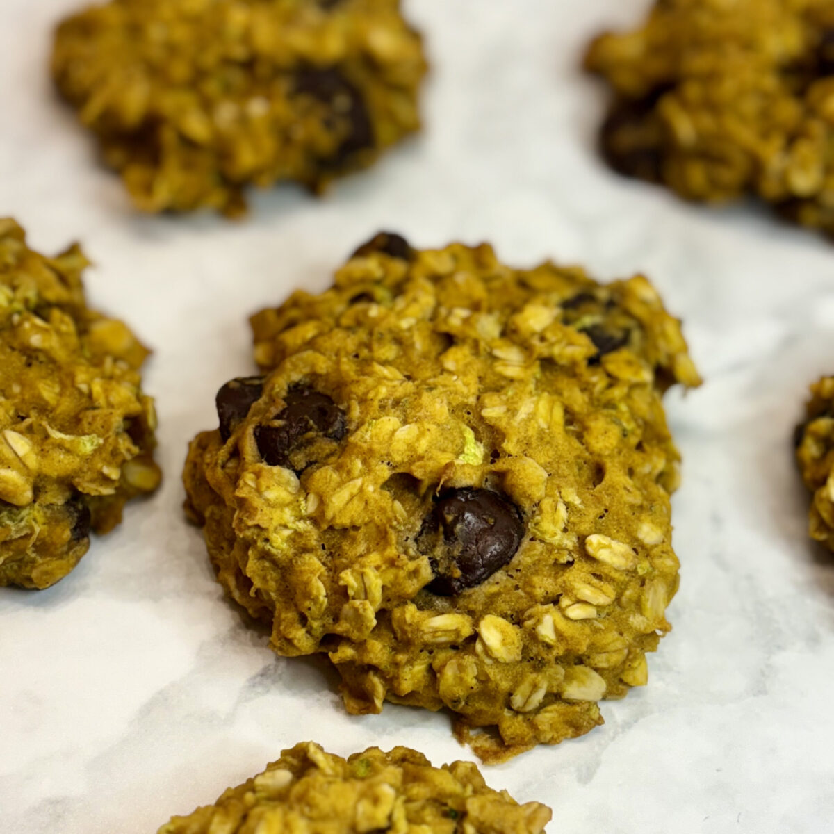 Veggies are treats in these healthy toddler snacks: cookies composed of chocolate, zucchini, pumpkin, and oats.