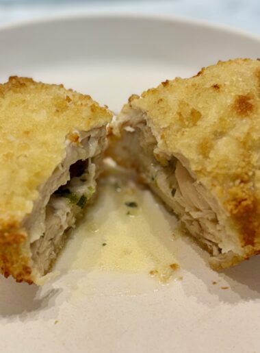 Chicken Kiev, split open to show butter sauce.