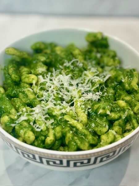 spaetzle, our preferred toddler pasta shape, is shown here covered in a cacio y pepe sauce mixed with kale.