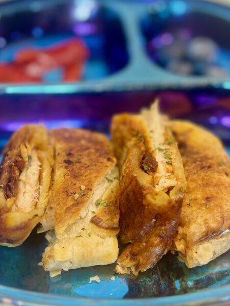 puff pastry for toddlers, in the form of chicken tikka masala stuffed into a calzone.