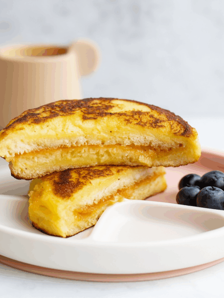 Ultimate french toast, in the form of Hong Kong style french toast, with two custardy slices of bread enrobing peanut butter.