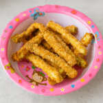 toddler veggies fries, made from zucchini, are presented in a bowl.