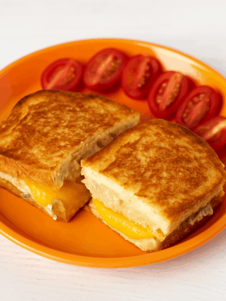 A fun way of introducing tuna sandwiches to toddlers: turn tuna and avocado into a mousse, then cook as grileld cheese.