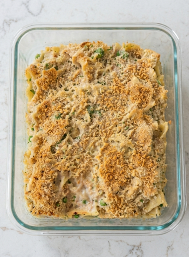 Overhea shot of a just cooked tuna casserole for kids still in its pan, its burnished breadcrumb topping prominent.