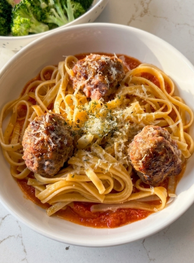 Bowl of toddler spaghetti and meatballs.