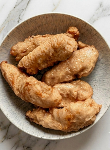 A platter full of homemade chicken tenders for kids.
