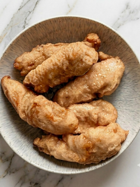 A platter full of homemade chicken tenders for kids.